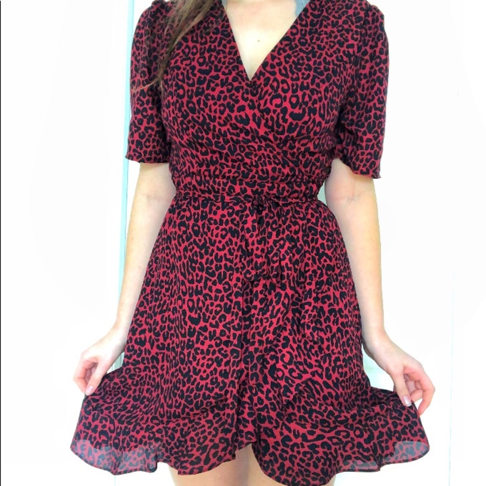 Red & black cheetah print ruffled wrap dress.